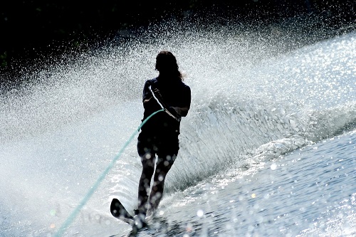 A person is water skiing on the lake.